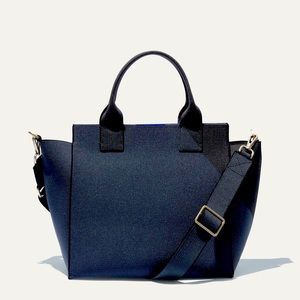 Rothy’s handbag. Barely used. Like new, comes with original Rothy’s dust bag.